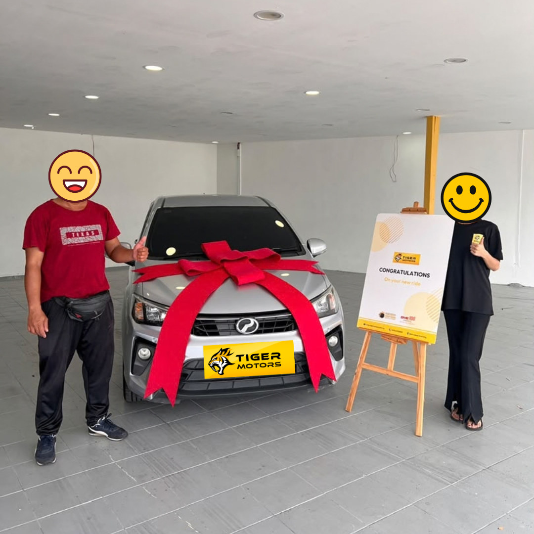Customer collecting their 2020 Perodua Bezza from Tiger Motors in Kuching, Sarawak