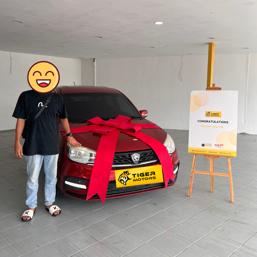 Customer collecting their 2019 Proton Saga from Tiger Motors in Kuching, Sarawak